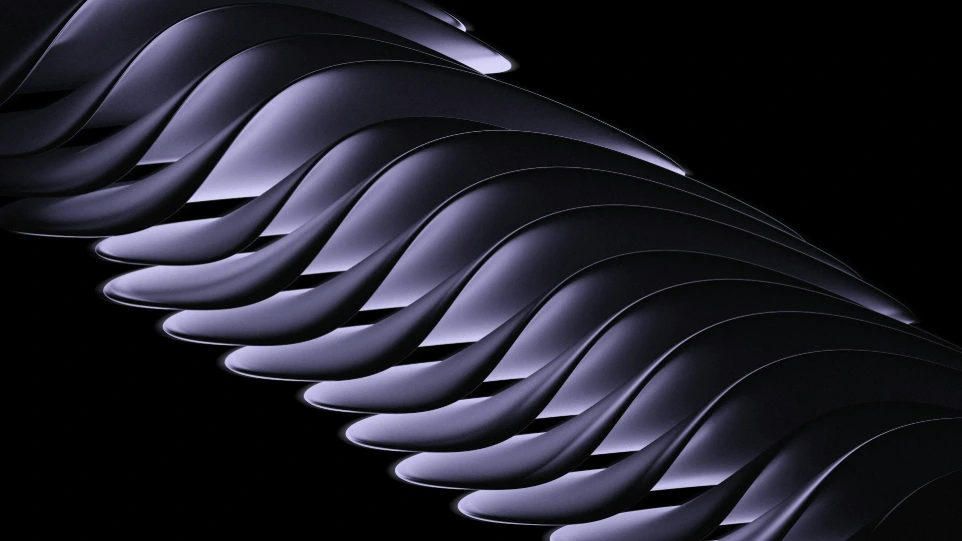 Abstract metallic waves against a black background